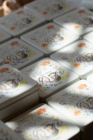 Batch of illustrated cookie tins for a Jane Goodall Institute Japan fundraiser